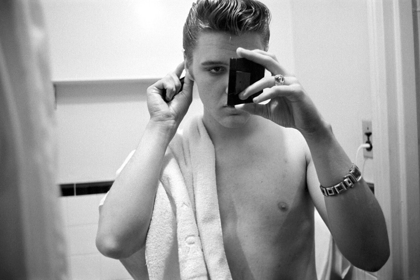 Elvis in his hotel bathroom at The Warwick Hotel in New York before 'Stage Show', 1956.