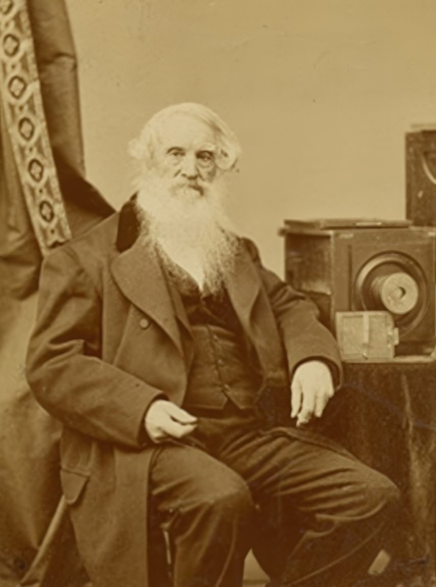 Samuel F. B. Morse with his camera. The albumen photograph by A. Bogardus of New York shows an older Morse with his daguerreotype camera beside him on a table. In addition to his accomplishments as a painter and inventor of the telegraph Morse was a very early practitioner of the daguerreotype process. He was given a demonstration by Daguerre himself in 1839 before the public presentation. Morse taught the process to a succession of eager American photographers, including Mathew Brady.