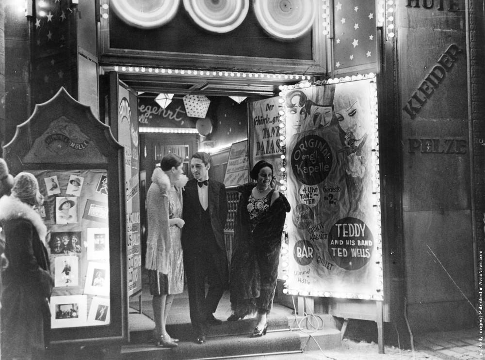 People outside a cabaret show in Germany, 1925.