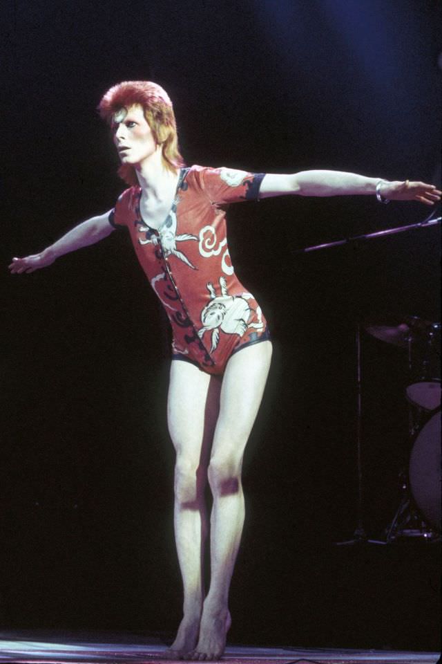 David Bowie in a Kansai Yamamoto-designed bodysuit performing at the Hammersmith Odeon, 1973.