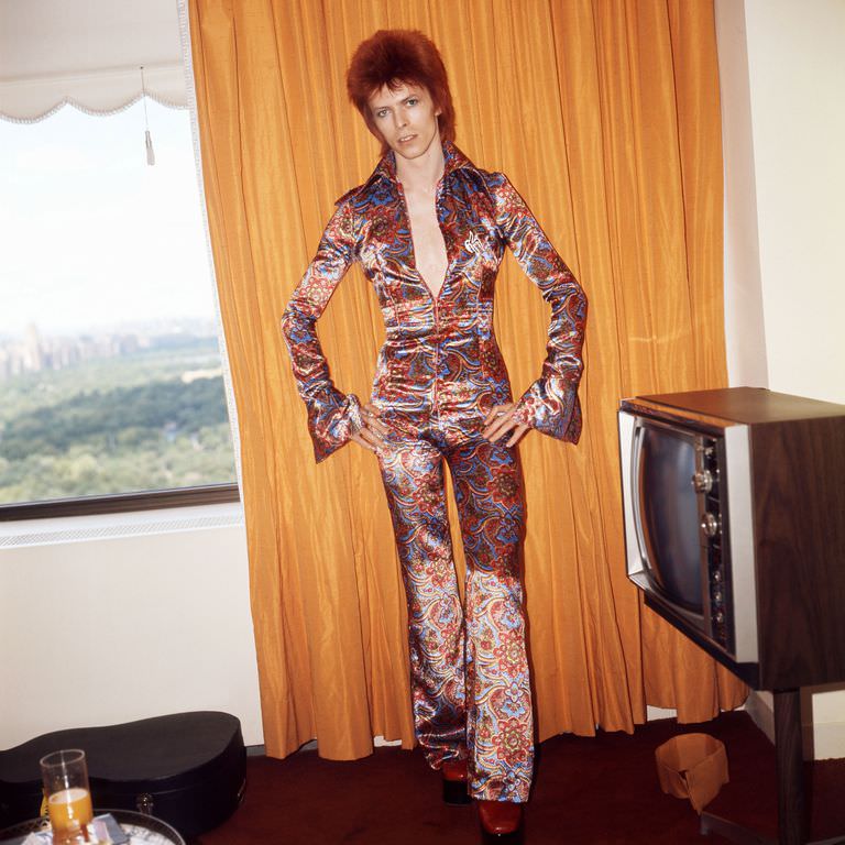 David Bowie in a silk flared jumpsuit in New York City, 1973.