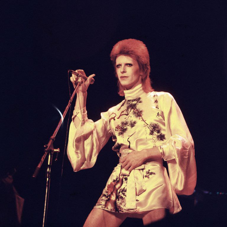 David Bowie in a printed mini dress on his Ziggy Stardust/Aladdin Sane tour in London, 1973.