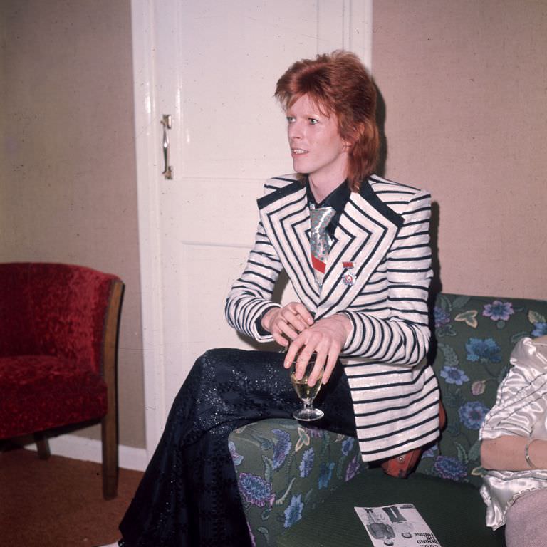 David Bowie in a striped blazer with wide lapels, 1973.
