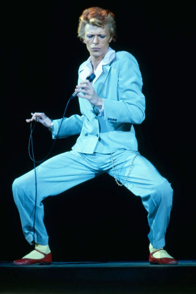 David Bowie in a blue suit performing in Los Angeles during his Diamond Dogs tour, 1974.