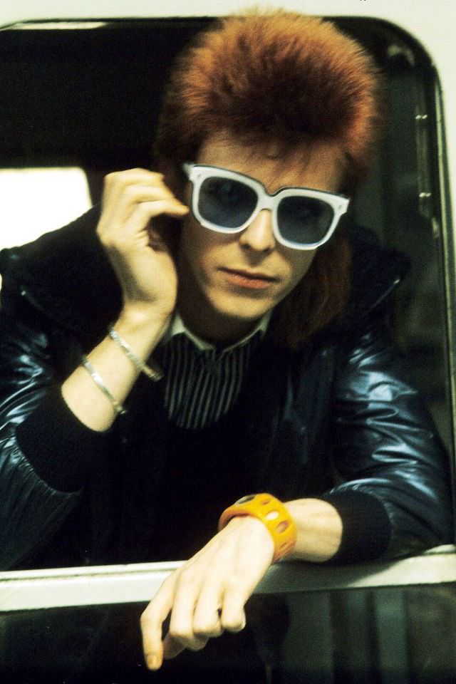 David Bowie in sunglasses, pictured in England, 1974.
