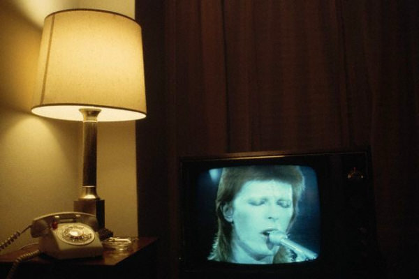 David Bowie performing as Ziggy Stardust on TV at the Delmonico Hotel, New York, 1974.