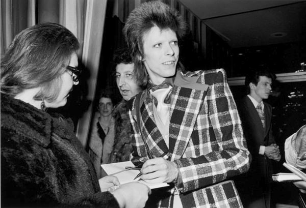 David Bowie signing autographs for fans in Los Angeles, 1973.