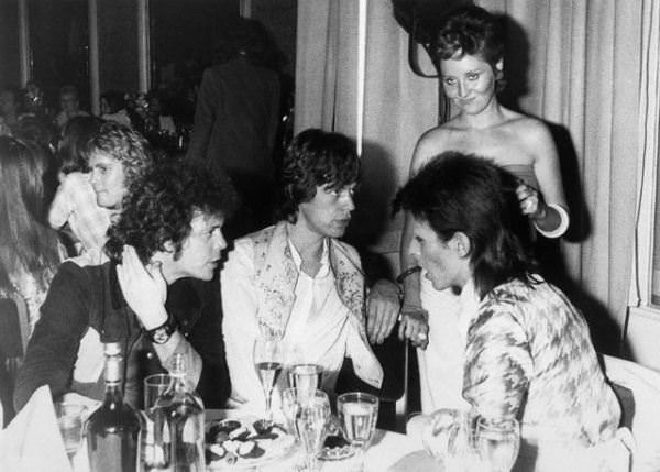 David Bowie's party at the Cafe Royal, London; Lou Reed, Mick Jagger, and Lulu also present, 1973.