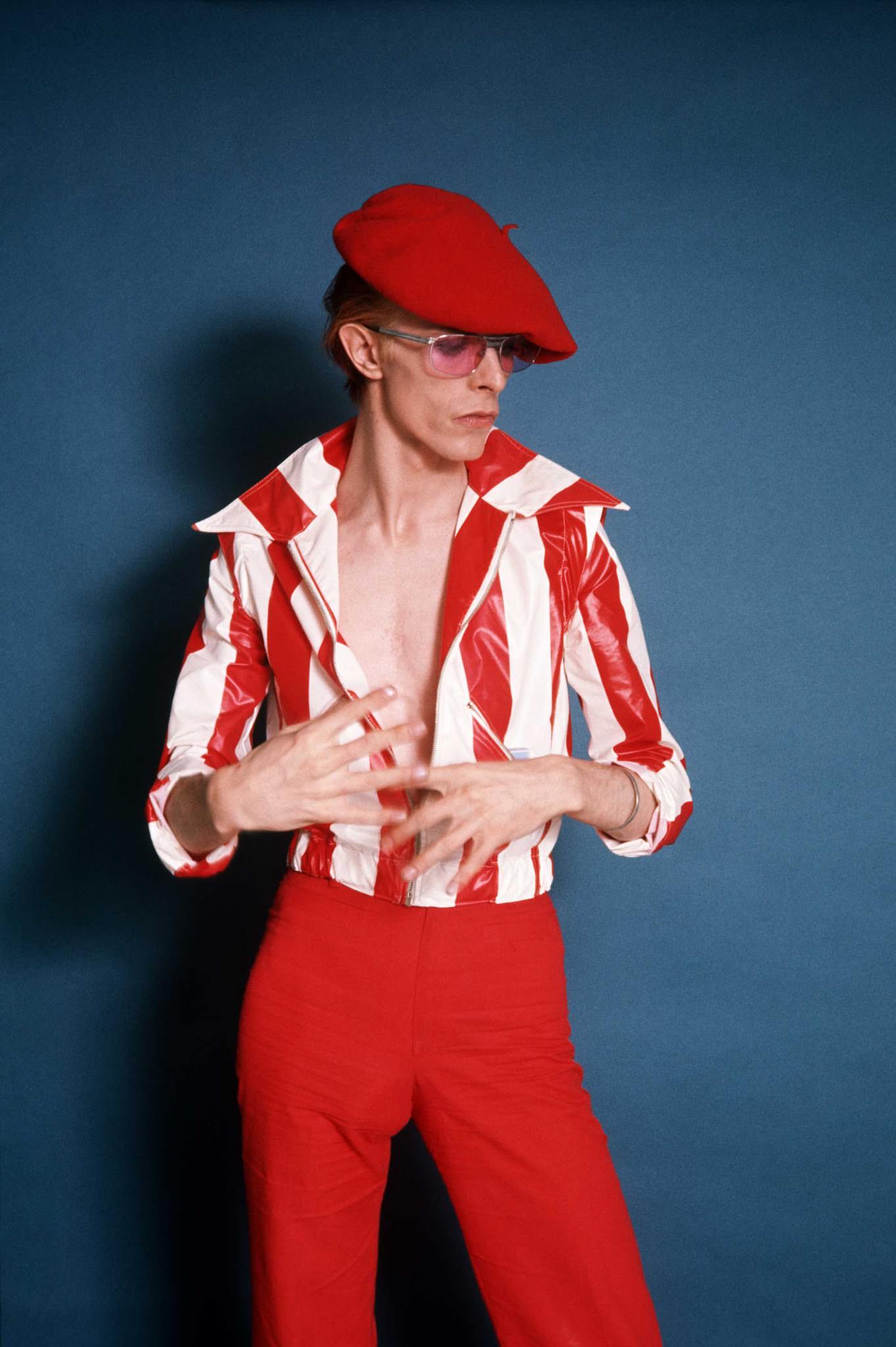 David Bowie in a red and white striped outfit, Los Angeles, 1974.