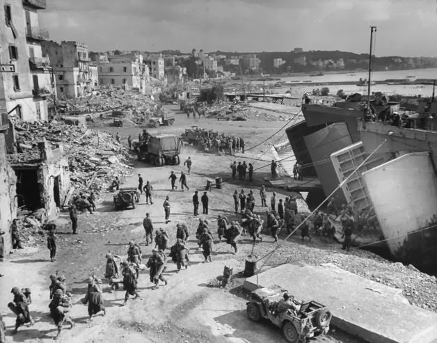 LSTs unloading troops in Anzio harbor, 1944.