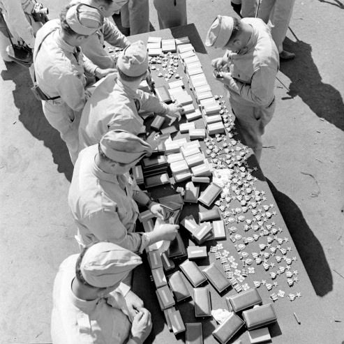 Preparing for a medal ceremony at Anzio, 1944.