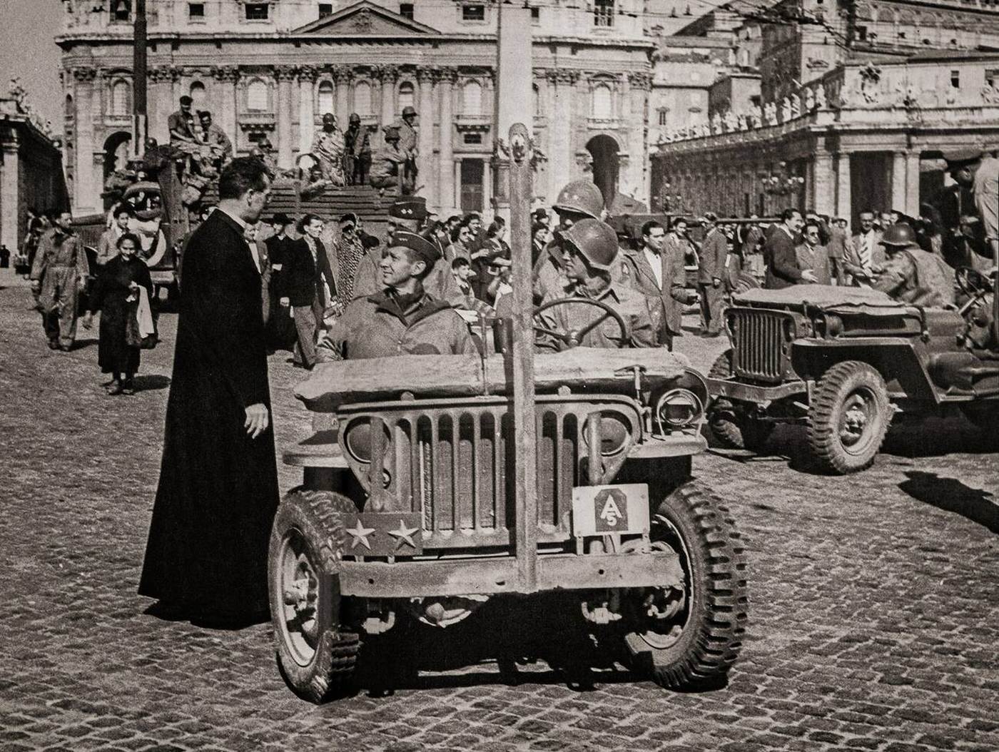 General Mark Clark with a priest in front of St. Peter's Cathedral, 1944.