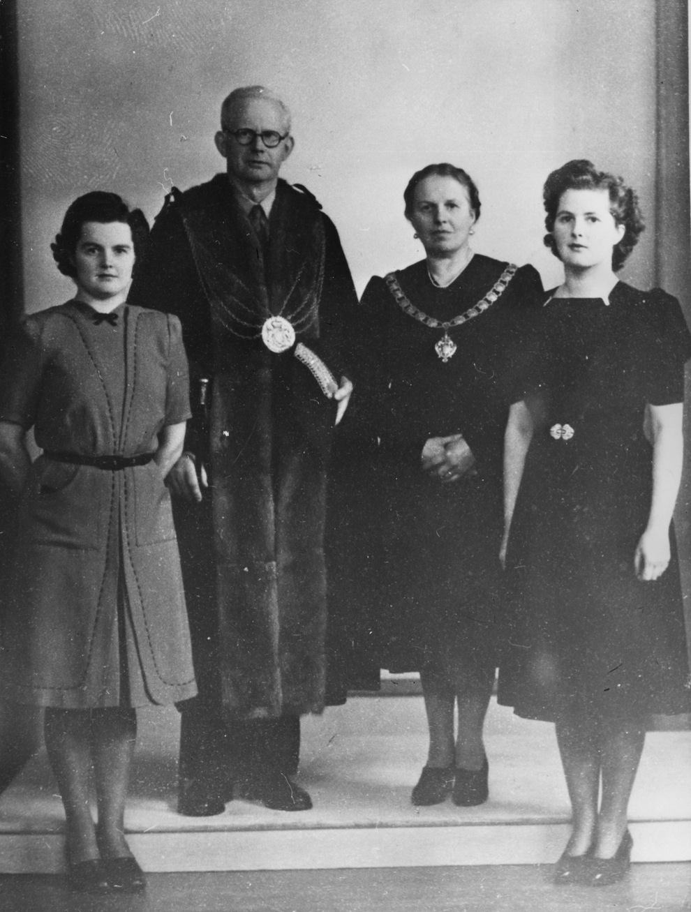 Born Margaret Hilda Roberts in 1925, pictured aged 20, with her parents and sister Muriel (left).