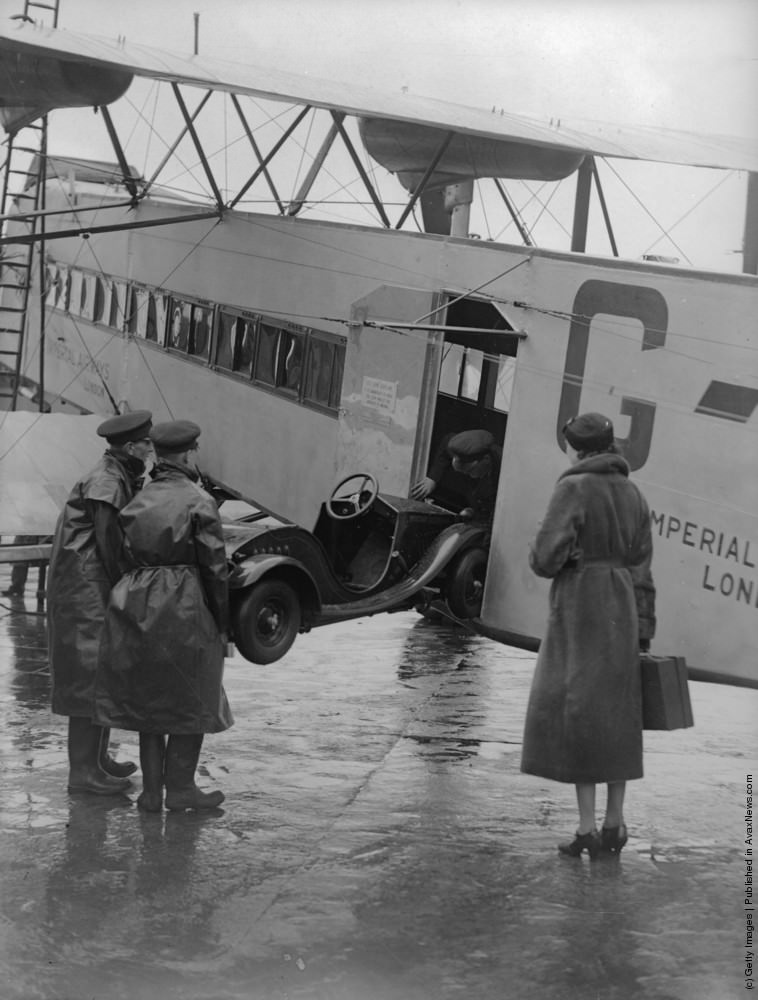 Shillan's miniature Rytecraft car being loaded onto a plane at Croydon Airport, London, for transport to Paris. December 1934.