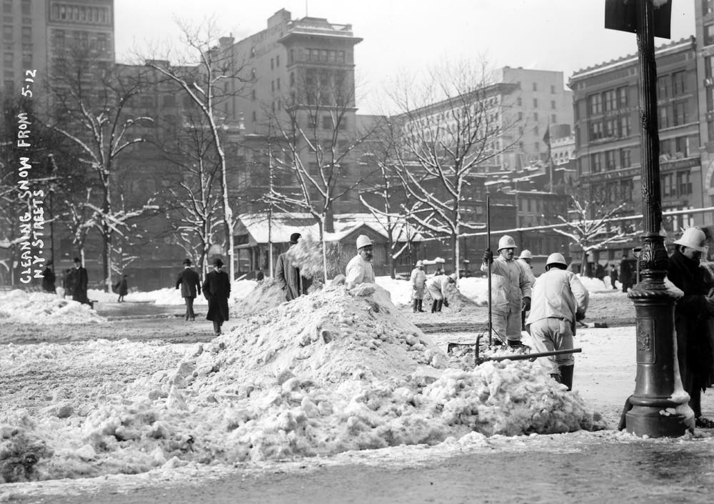 Cleaning snow from New York City streets, January 1908.
