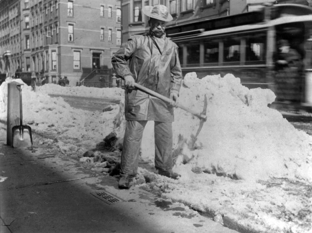 Street cleaner with pickax, New York City, 1896.