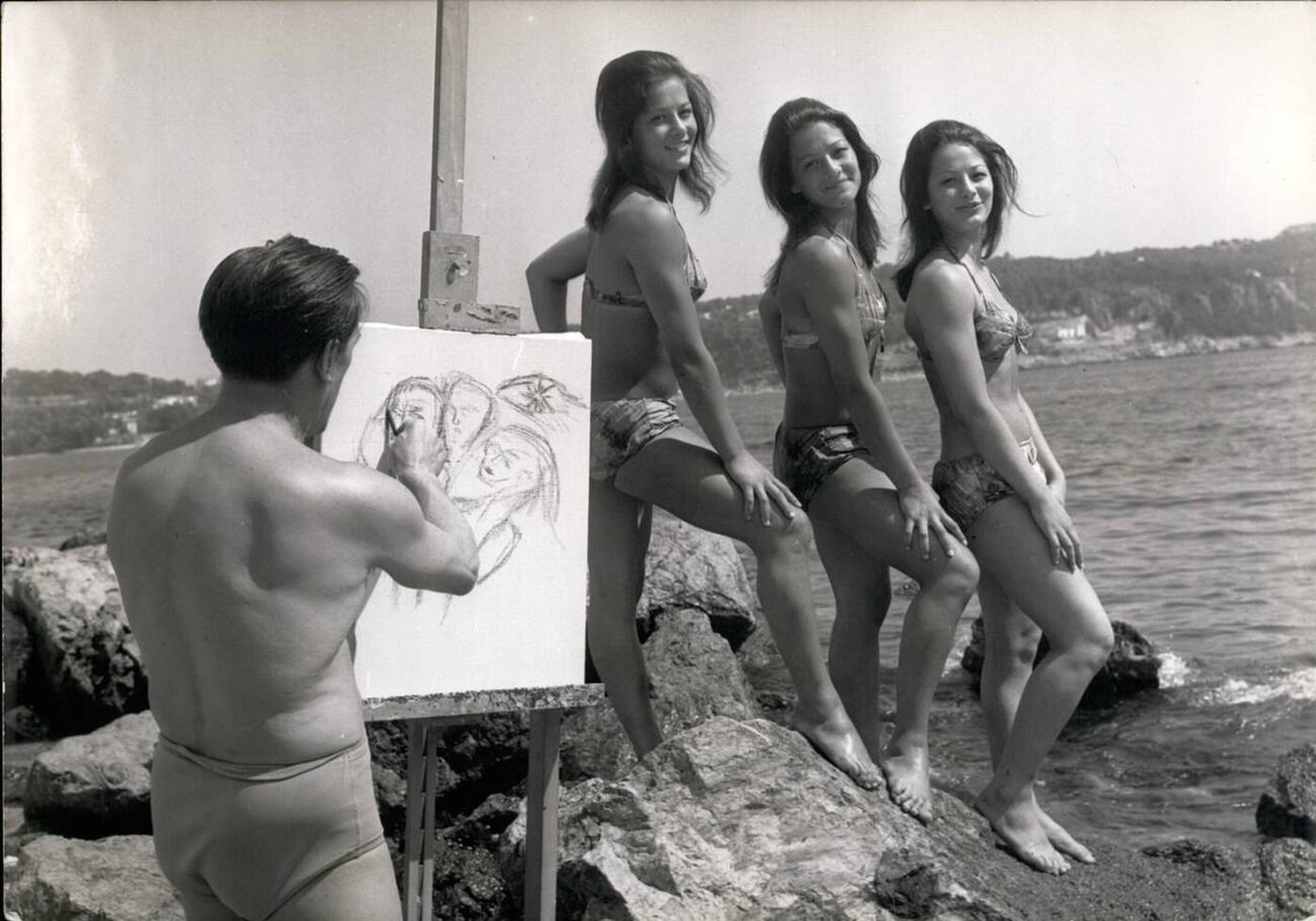 The Bisconti triplets posing for painter Arrieu on the beach, 1961.