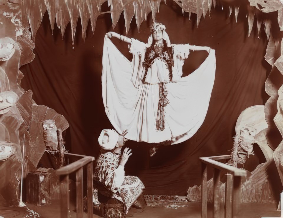 Show at Coney Island with a man “levitating” a woman on stage, ca. 1908.