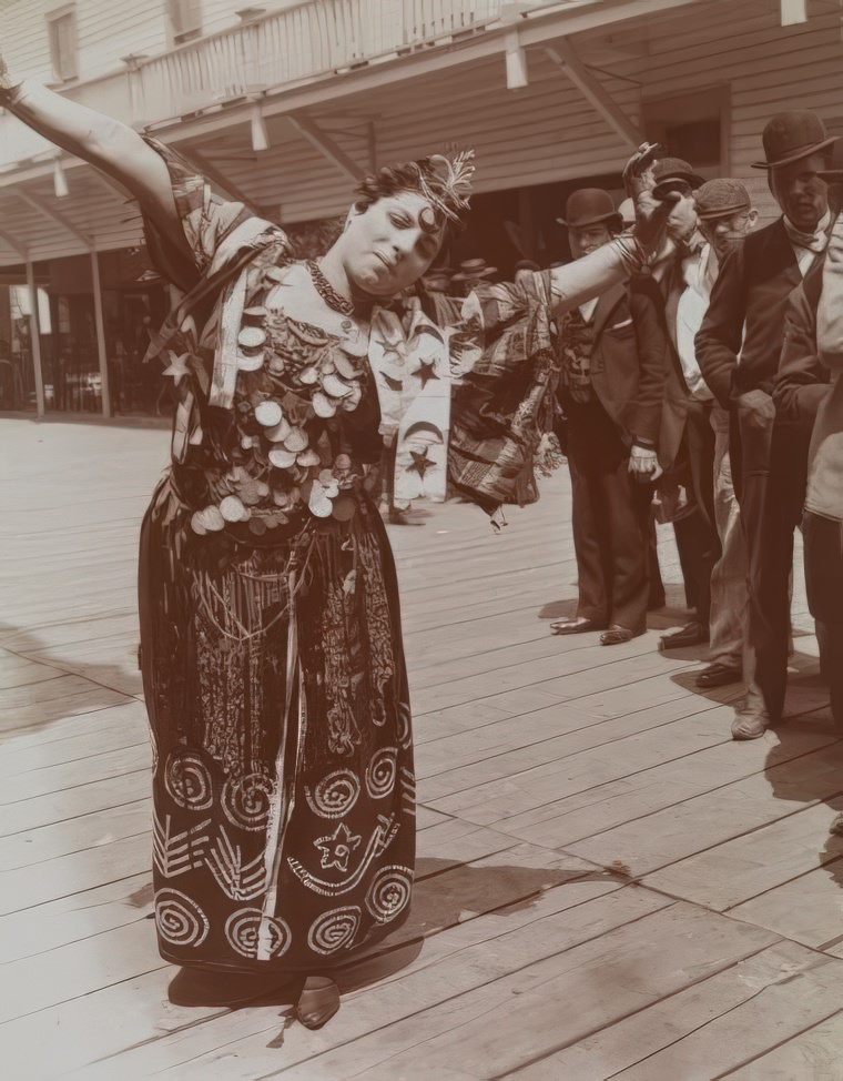 Woman gypsy/dancer posing outside at Coney Island, ca 1896.