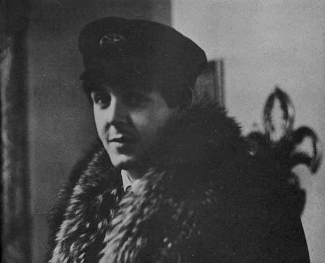 Paul McCartney modeling fashionable clothing.