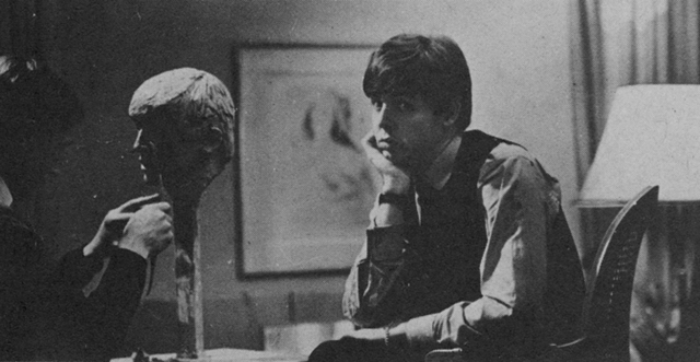 Paul McCartney looking bored.