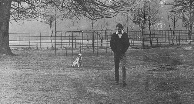 Lord Rudolph with his dog at Woburn Abbey.