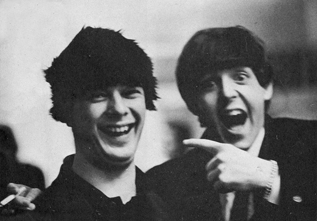 Brian Epstein wearing a Beatle wig.