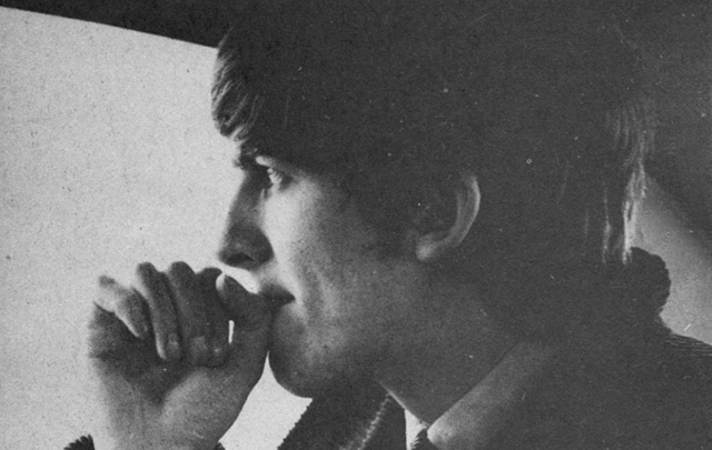 George Harrison, urged to smile.