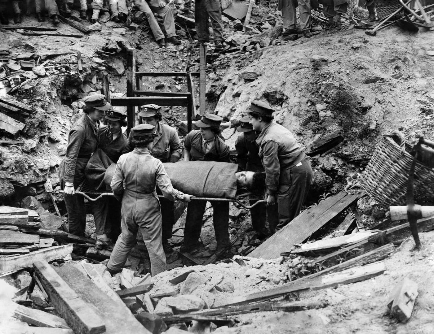 ATS members removing casualties, 1944
