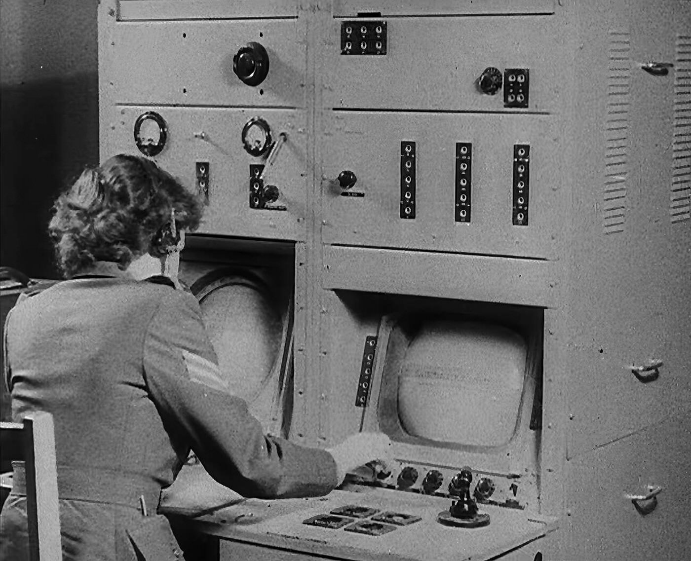 A woman operating a radio, 1940