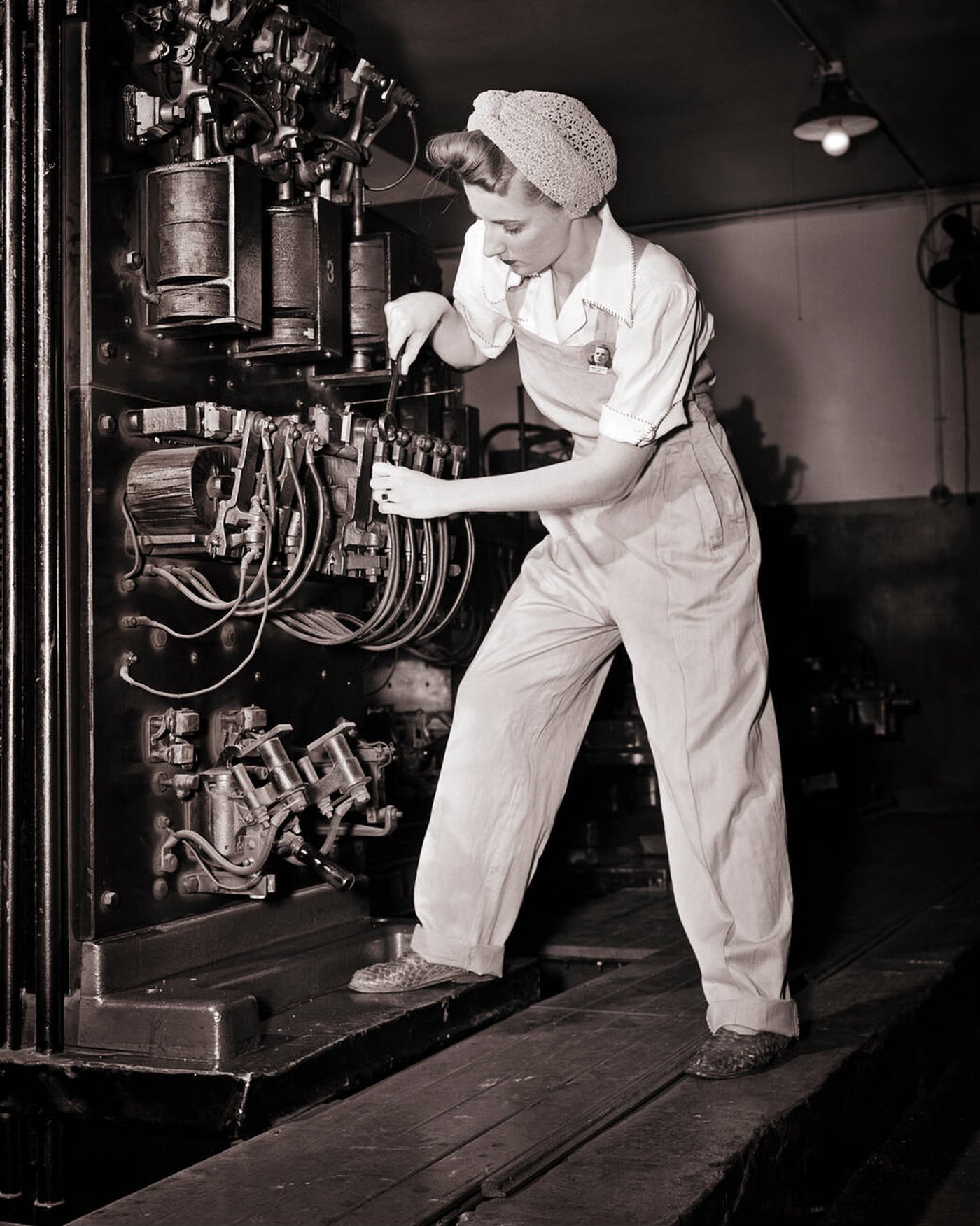 A woman working as an elevator mechanic, 1940s