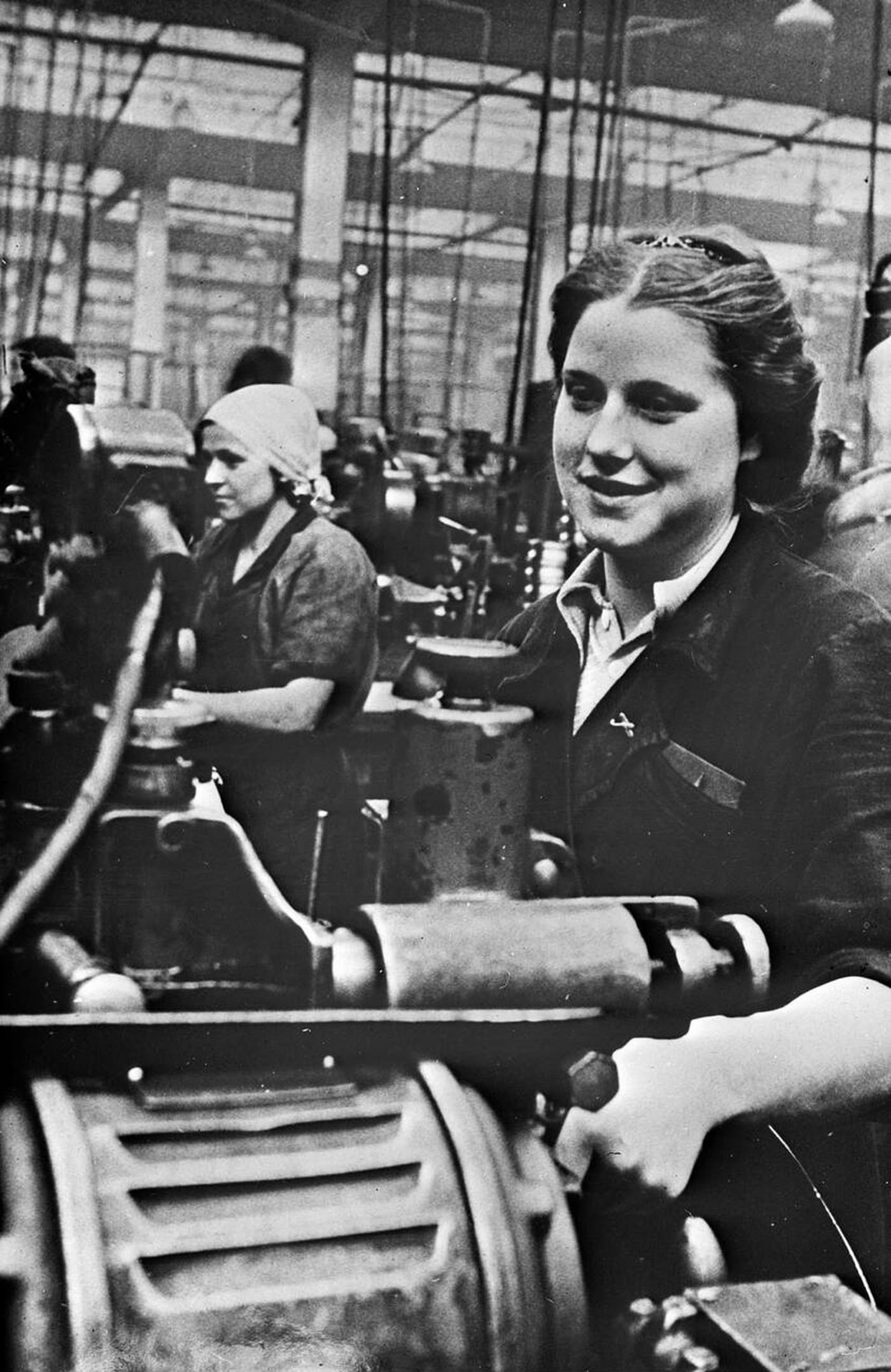 Women operating a lathe in the USSR, World War II