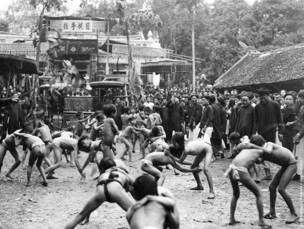 Children's wrestling contest in Hadong, Indo-China, 1920s