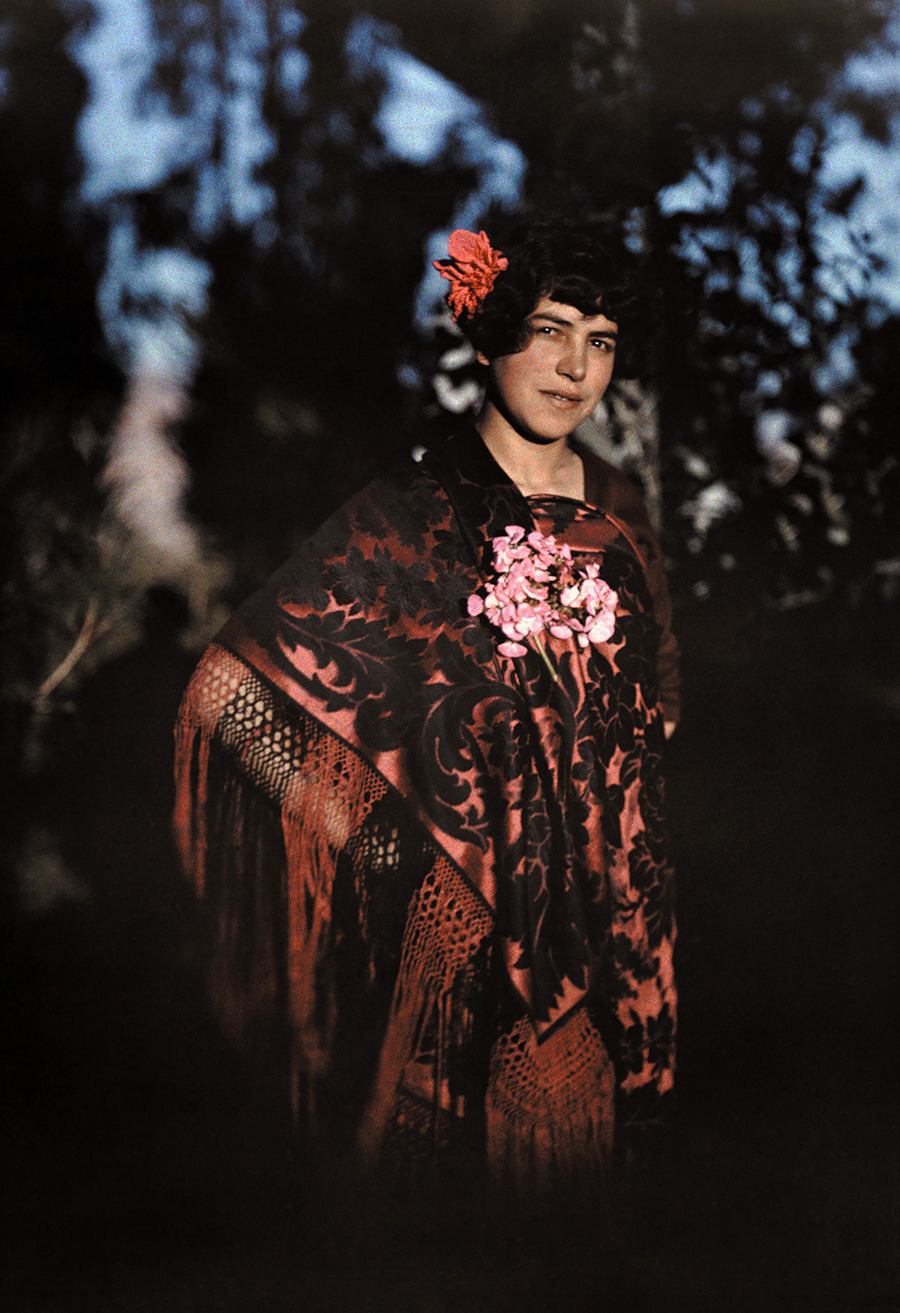 The daughter of a conquistadore poses in her elaborate poncho in La Paz, Bolivia, February 1927.