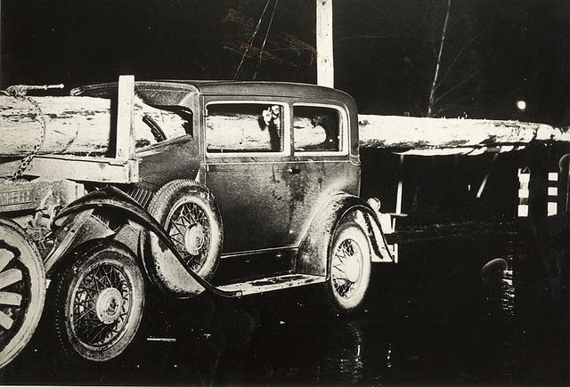 Traffic accident in Buffalo, New York; a car drove at full speed into a truck carrying timber, 1929.