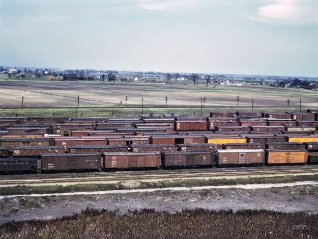 May 1943. Bensenville, Illinois. “C. M. St. P. & P. R.R. [Chicago, Milwaukee, St. Paul & Pacific Railroad], general view of part of the yard.” 4×5 Kodachrome transparency by Jack Delano for the Office of War Information.