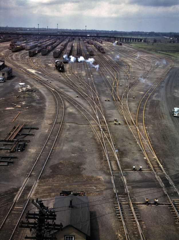 Chicago, April 1943. More of those yellow Proviso rails. “General view of one of the departure yards at Chicago & North Western RR’s Proviso Yard.” 4×5 Kodachrome transparency by Jack Delano for the OWI.
