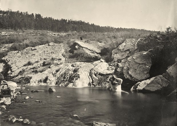 Man bathing in Pagosa Hot Spring, Colorado. Taken in 1874.