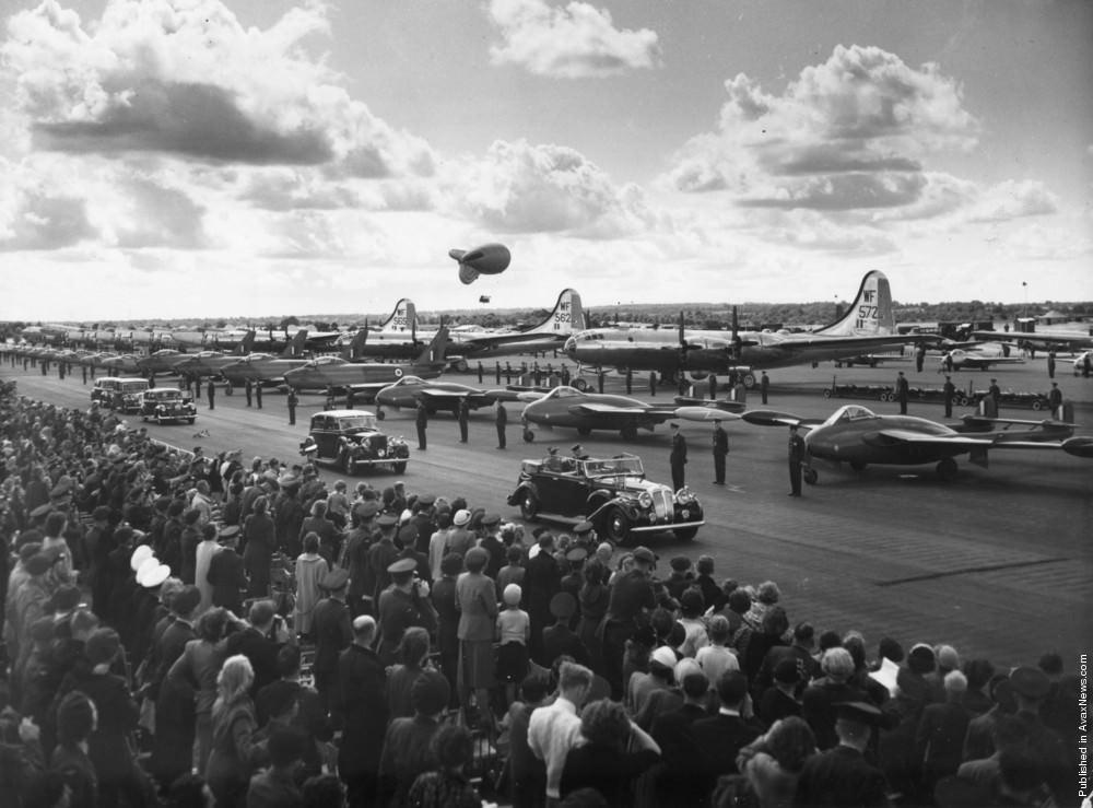 Queen Elizabeth II at the Coronation Review of the RAF at Odiham, Hampshire, inspecting aircraft including de Havilland Venoms, B-29 Superfortresses, and F-86 Sabres, 1953.