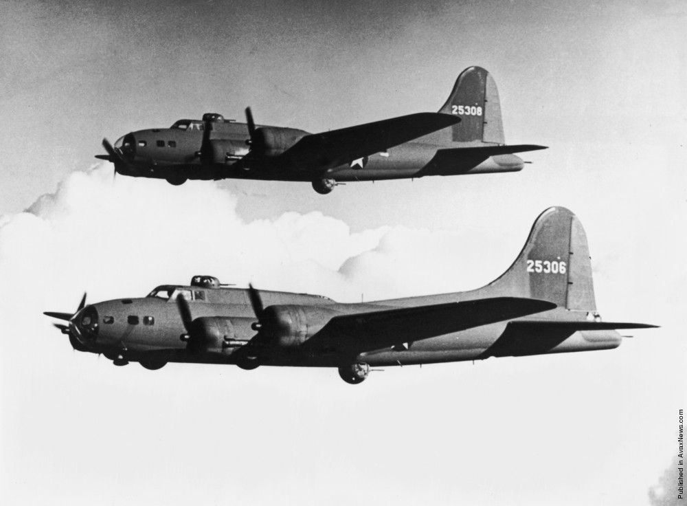 Two U.S. Boeing B-17 Flying Fortress bombers in flight near Seattle, 1944.