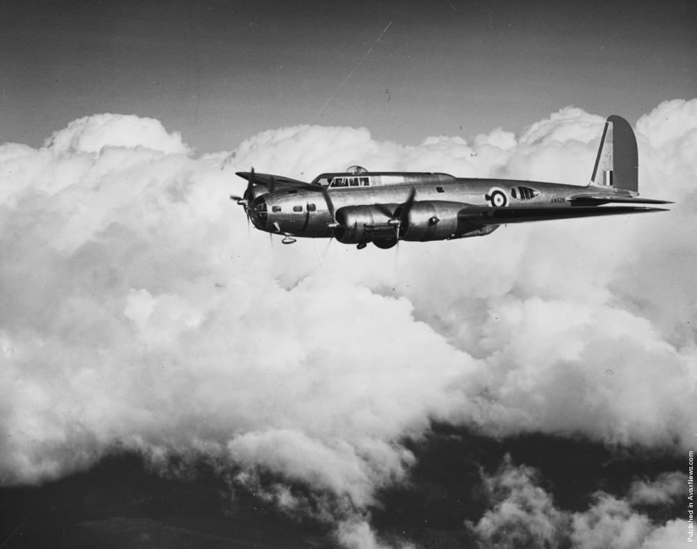 A Boeing B-17-C-type Flying Fortress bomber in flight, 1950.