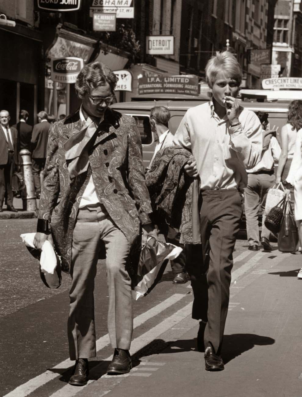 1 August 1967: Two young men walk down Carnaby Street.