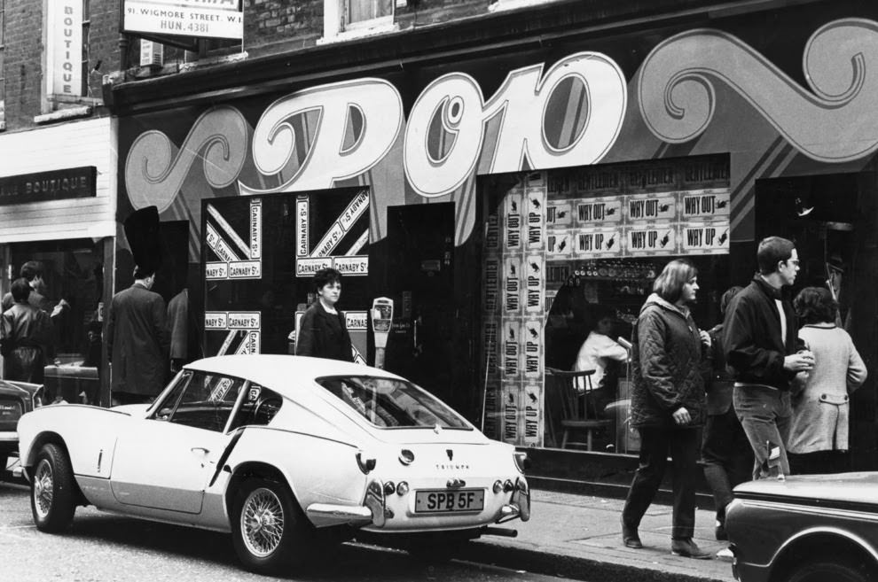 8 April 1968: A Triumph Spitfire GT6 parked outside Pop boutique.