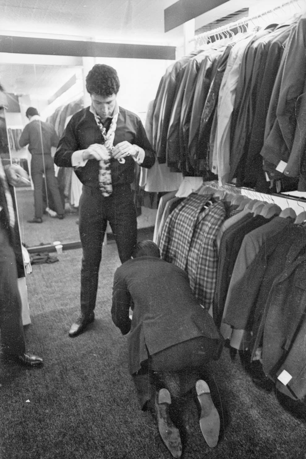 4th April 1966: Tom Jones has a fitting in Gear boutique.