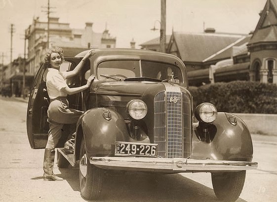 Film actor Helen Twelvetrees and her 1935 Pontiac, Moore Park, Sydney, 1936.