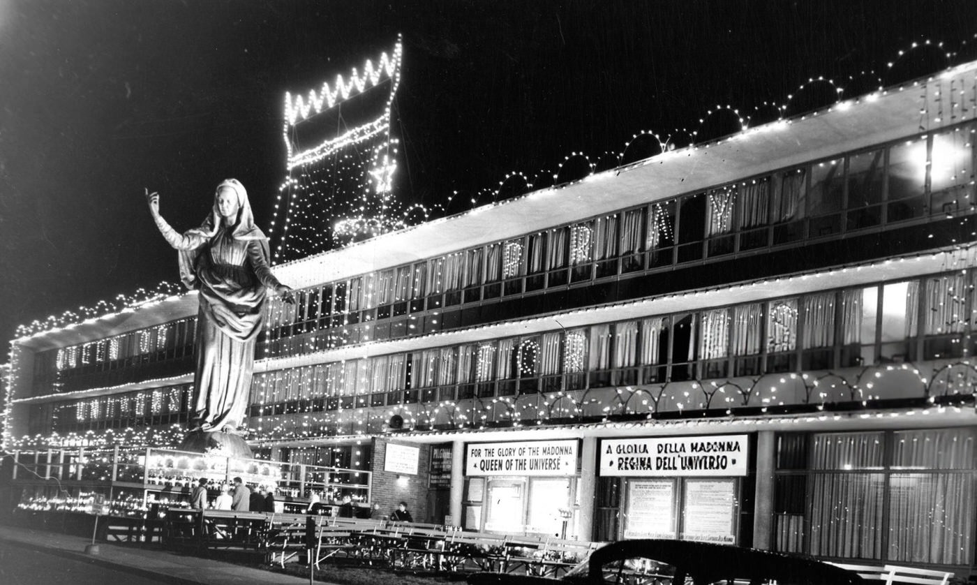 Christmas lights adorn the Don Orione Home and Madonna shrine in East Boston, 1959.