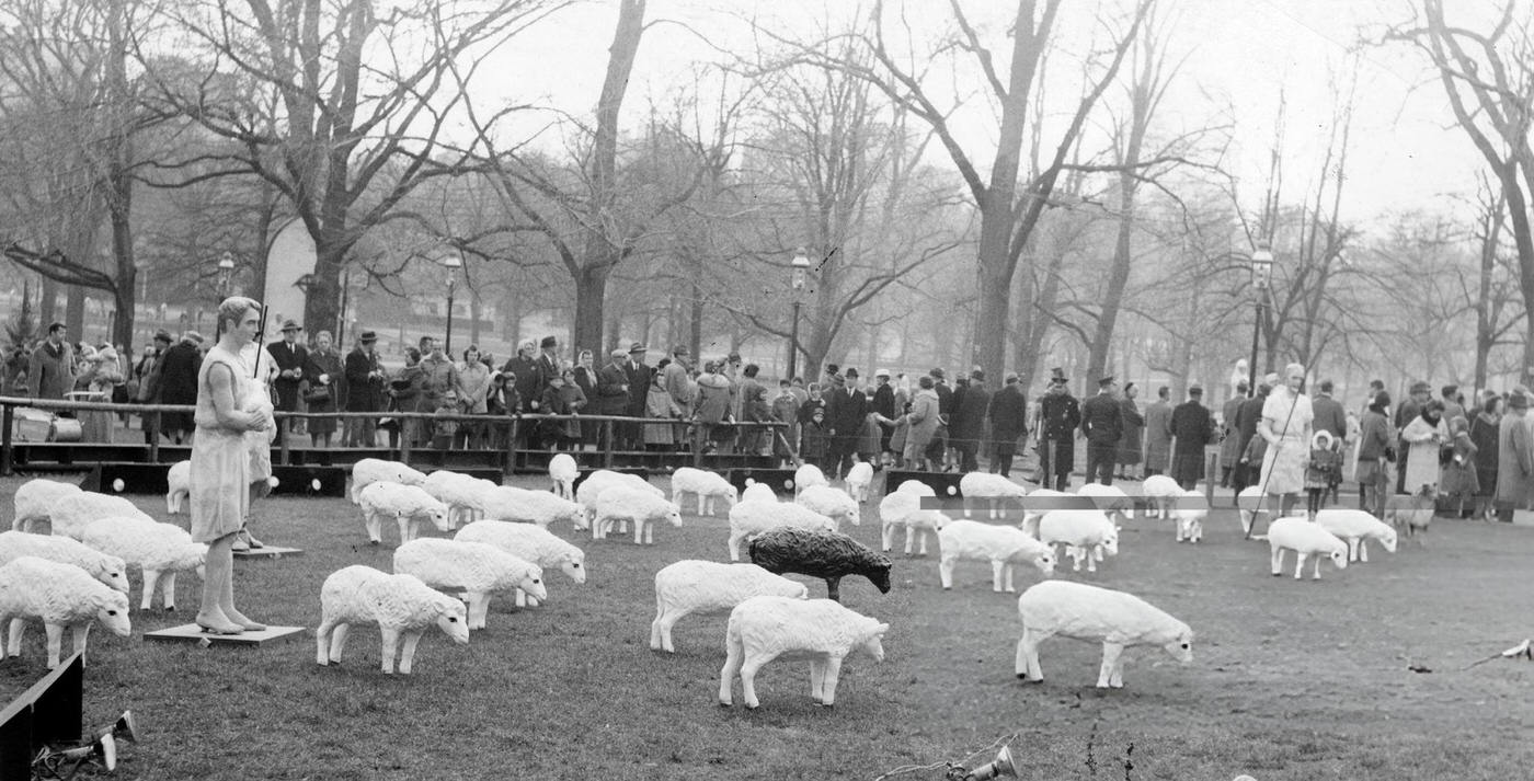 A crowd looks at the Christmas decorations on Boston Common, 1961.