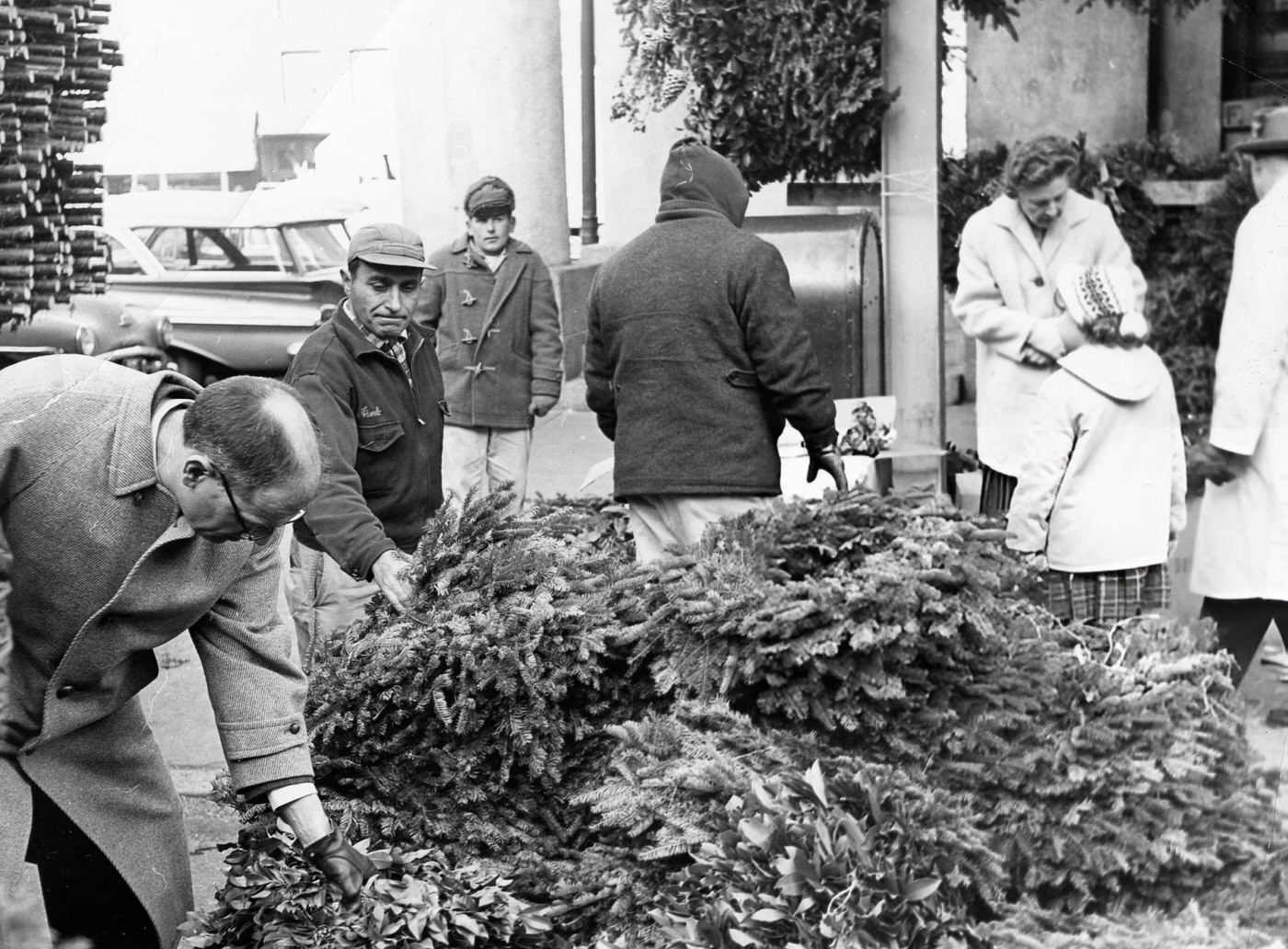 Stacks of Christmas wreaths are pictured near Faneuil Hall in Boston, 1961.