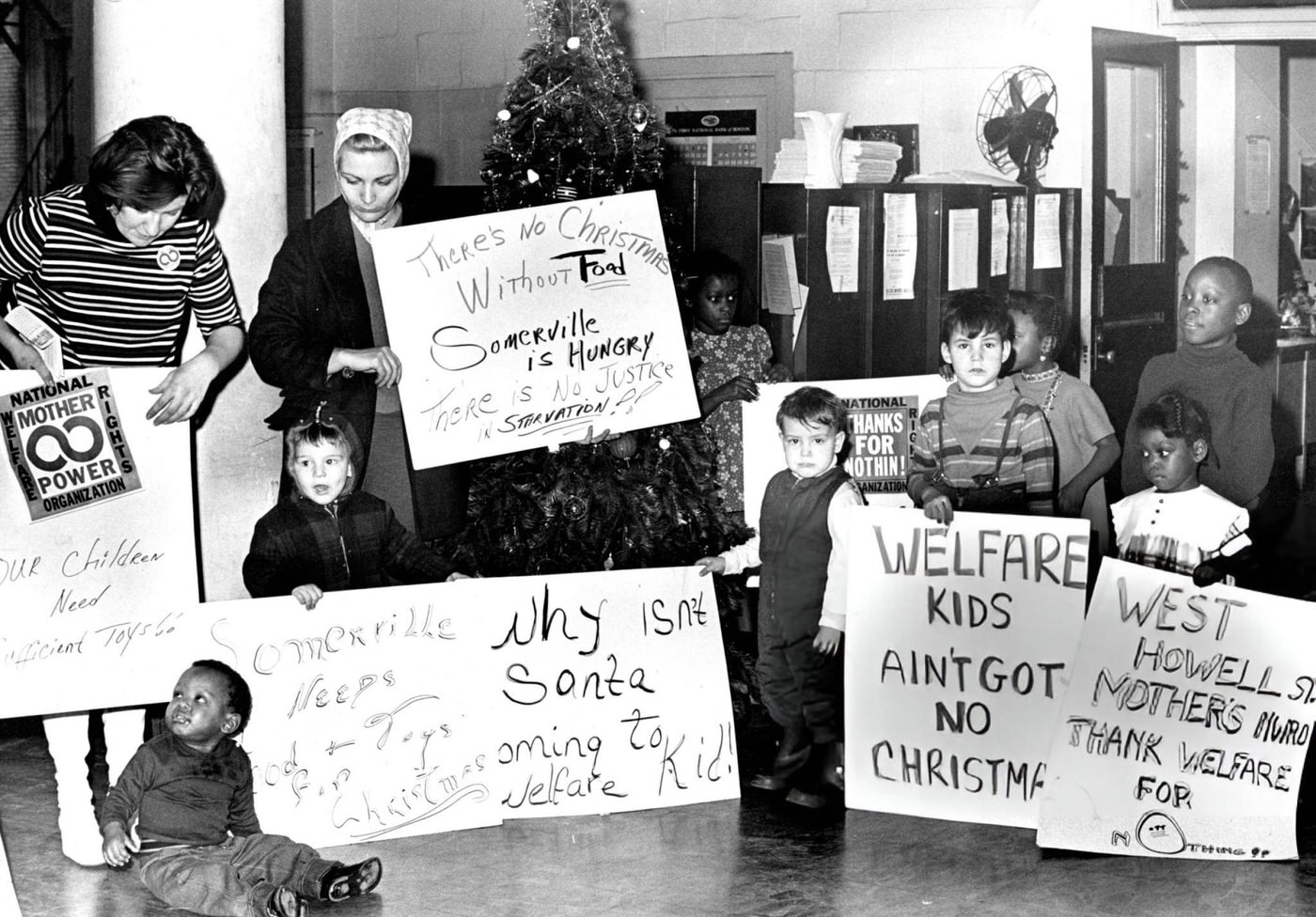 Mothers and children protest for toys, food and clothing for the Christmas holiday at the welfare office in Boston, 1968.