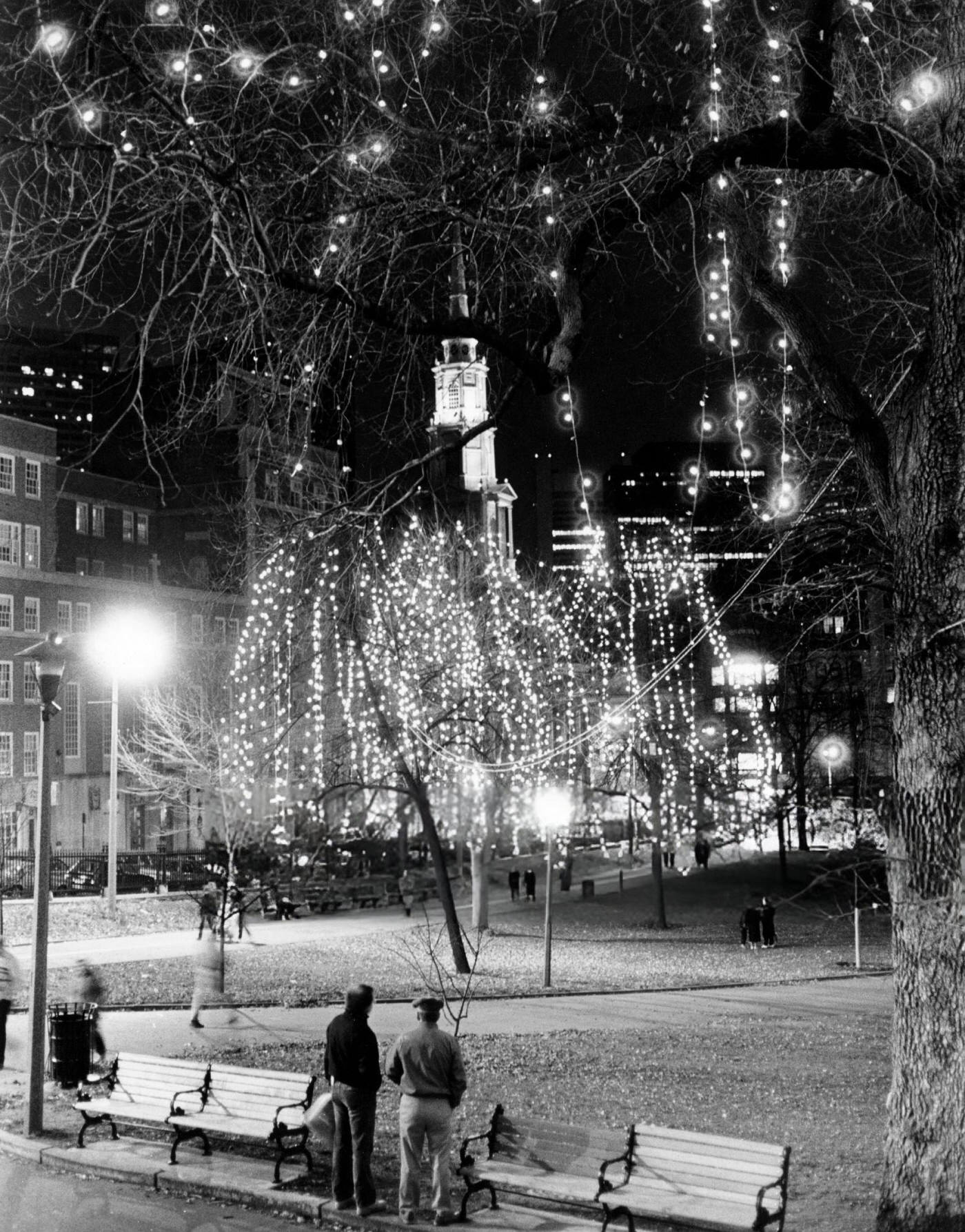 People look at the Christmas lights on Boston Common, 1985.